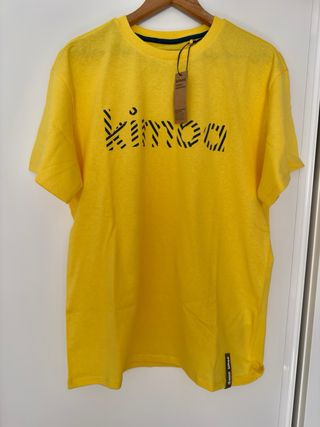 Camiseta Kimoa amarilla con etiqueta