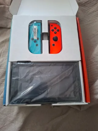 Nintendo Switch Azul/Rojo + Accesorios i juego