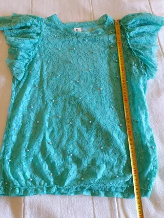 Blusa de encaje con perlas