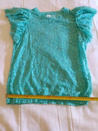 Blusa de encaje con perlas