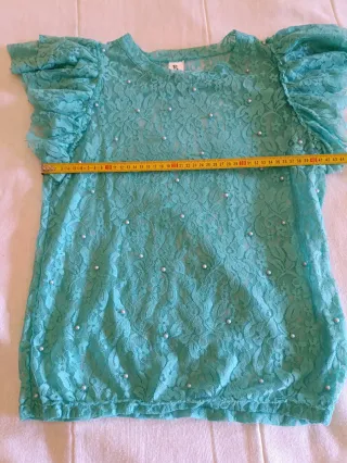 Blusa de encaje con perlas