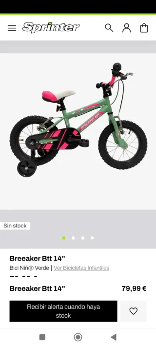Bicicleta infantil verde con ruedines