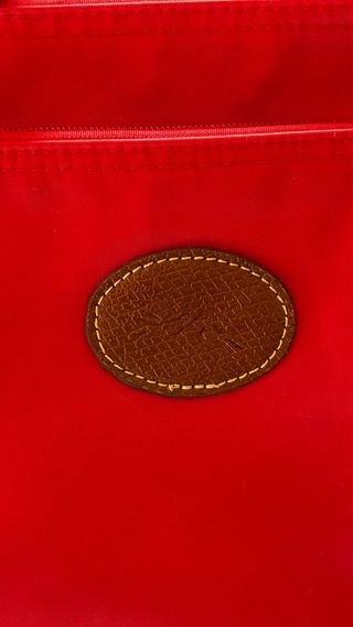 Borsa a busta Longchamp rossa
