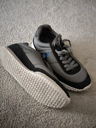 Zapatillas Le Coq Sportif grises y negras