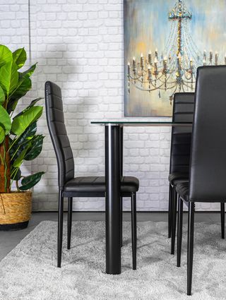 Conjunto de mesa con 4 sillas negro