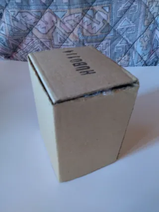 Porta monete in ceramica orso con cappello