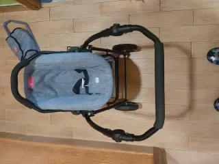 Cochecito de muñecas azul