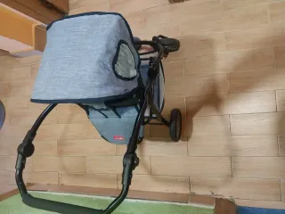 Cochecito de muñecas azul