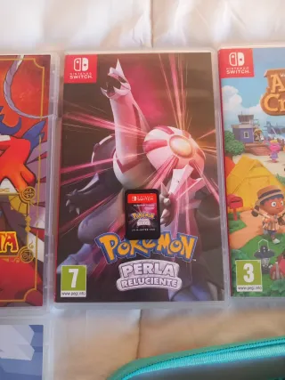 Nintendo Switch Lite + Custodia e 8 Giochi