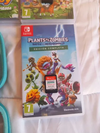 Nintendo Switch Lite + Custodia e 8 Giochi