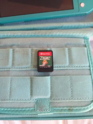 Nintendo Switch Lite + Custodia e 8 Giochi