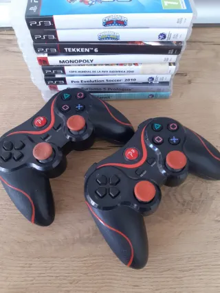 Lote de juegos y mandos de ps3