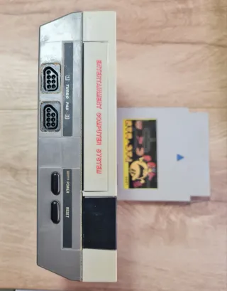 Consola Nintendo con cables y cargador