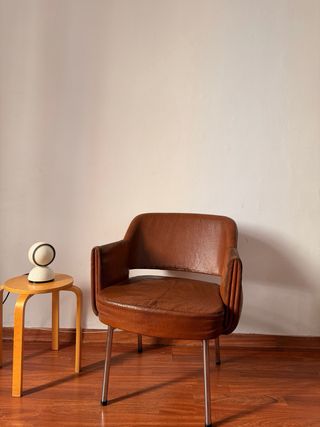 Poltrona vintage in pelle e metallo