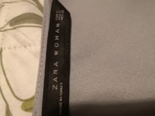 Blusa sin manga Zara gris y negra