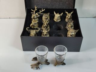 12 shot di 25 ml con base di animali in metallo