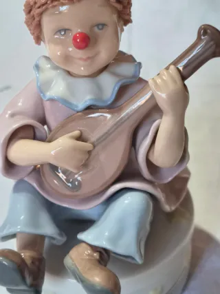 Statua carillon clown con argento