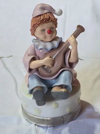 Statua carillon clown con argento