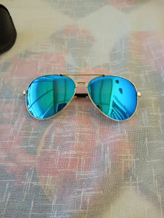 Occhiali da sole Police blu e oro