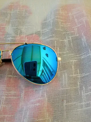 Occhiali da sole Police blu e oro