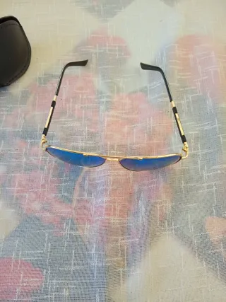 Occhiali da sole Police blu e oro