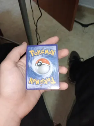 Carta Pokémon Reshiram y Charizard GX 2019