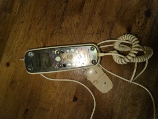 Teléfono analógico retro beige