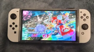 Nintendo Switch OLED + Mario Kart 8 Deluxe