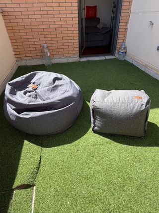 Puf in tessuto grigio