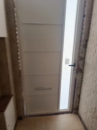 Fabricación a medida de Puerta entrada metálica