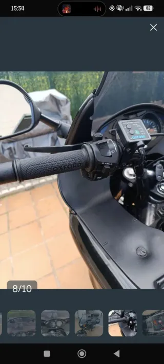 Moto Touring Negra con Baúl