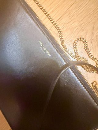 Bolso Clutch Saint Laurent Negro Dorado