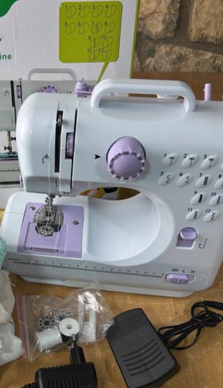 Máquina de coser mini eléctrica