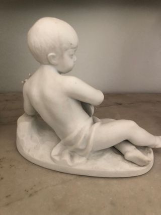 Figura porcelana biscuit Bidasoa niño músico.