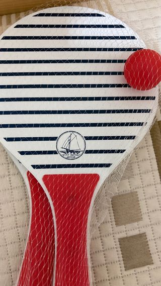 Raquetas de playa con pelota