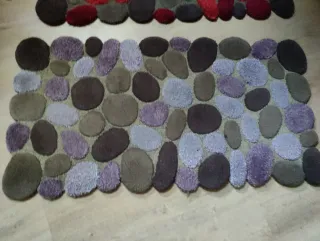 Alfombra piedras seminueva