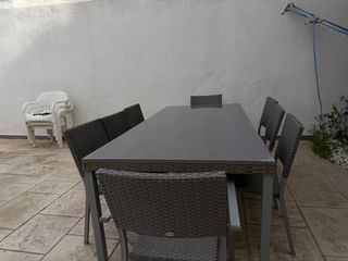 Mesa de cristal con 6 sillas de exterior