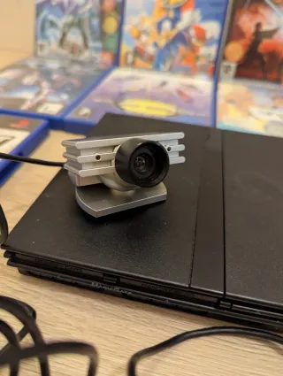 Pack PS2 Slim + Càmera EyeToy + 10 Jocs