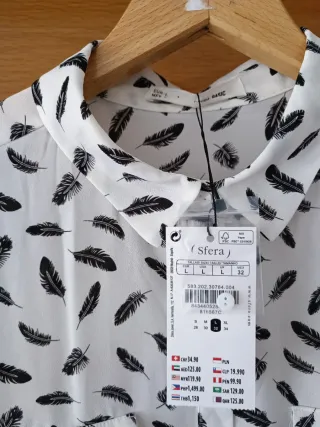 Blusa Sfera Estampado Plumas