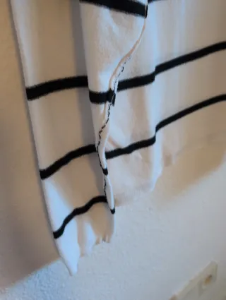 Jersey cuello alto rayas blanco y negro