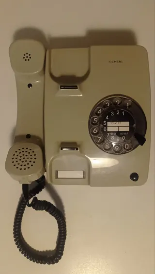 Teléfono antiguo Siemens de rueda beige