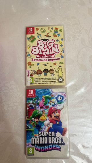 Nintendo Switch OLED + Mario Kart + Mario Wonder