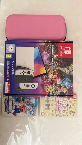Nintendo Switch OLED + Mario Kart + Mario Wonder