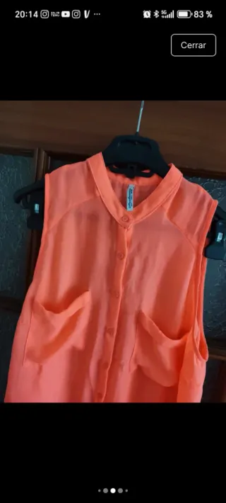 Blusa naranja sin mangas Stradivarius