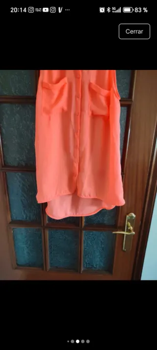 Blusa naranja sin mangas Stradivarius