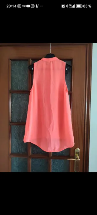 Blusa naranja sin mangas Stradivarius