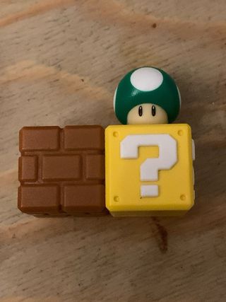 Super Mario Bros moneda y figuras