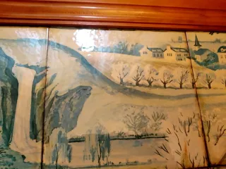 Cuadro de azulejos con paisaje rural