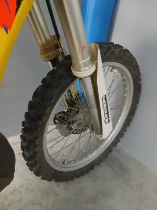Suzuki RM 250cc 2t cambio por bici eléctrica