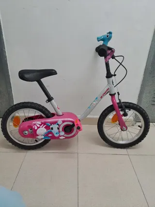 Bicicleta BTWIN infantil rosa con dibujos